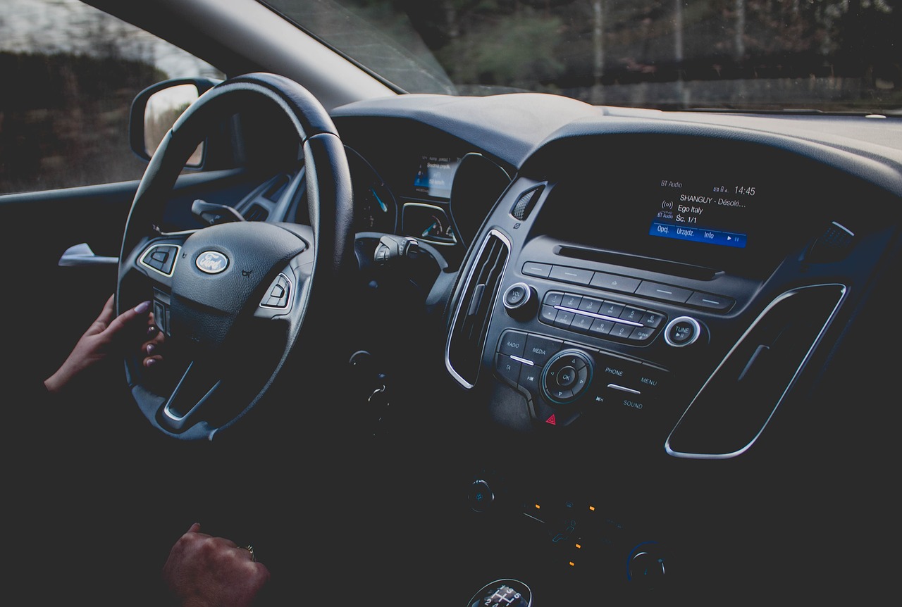 The front dashboard and steering wheel of a Ford vehicle