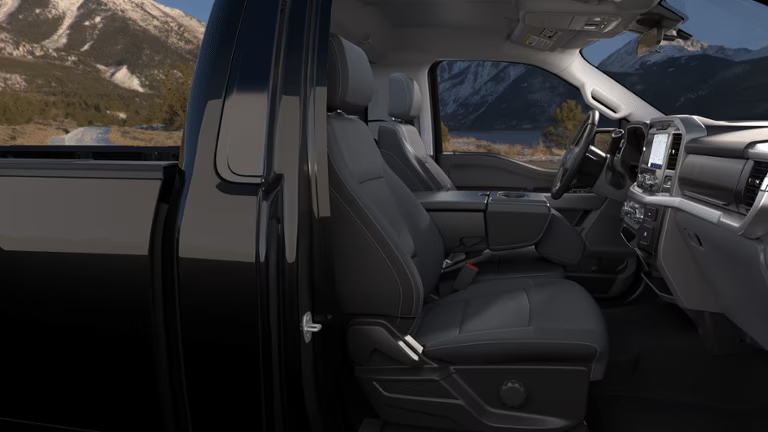 An interior View of the 2023 Ford F-150 XLT with mountains in the background